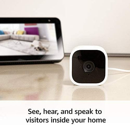 Blink Mini – Compact indoor plug-in smart security camera, 1080p HD video, night vision, motion detection, two-way audio, easy set up, Works with Alexa – 1 camera (White) - متجر الجيل العربي الرقمي